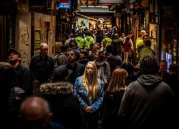 Looks dramatically different as she poses in a bikini
